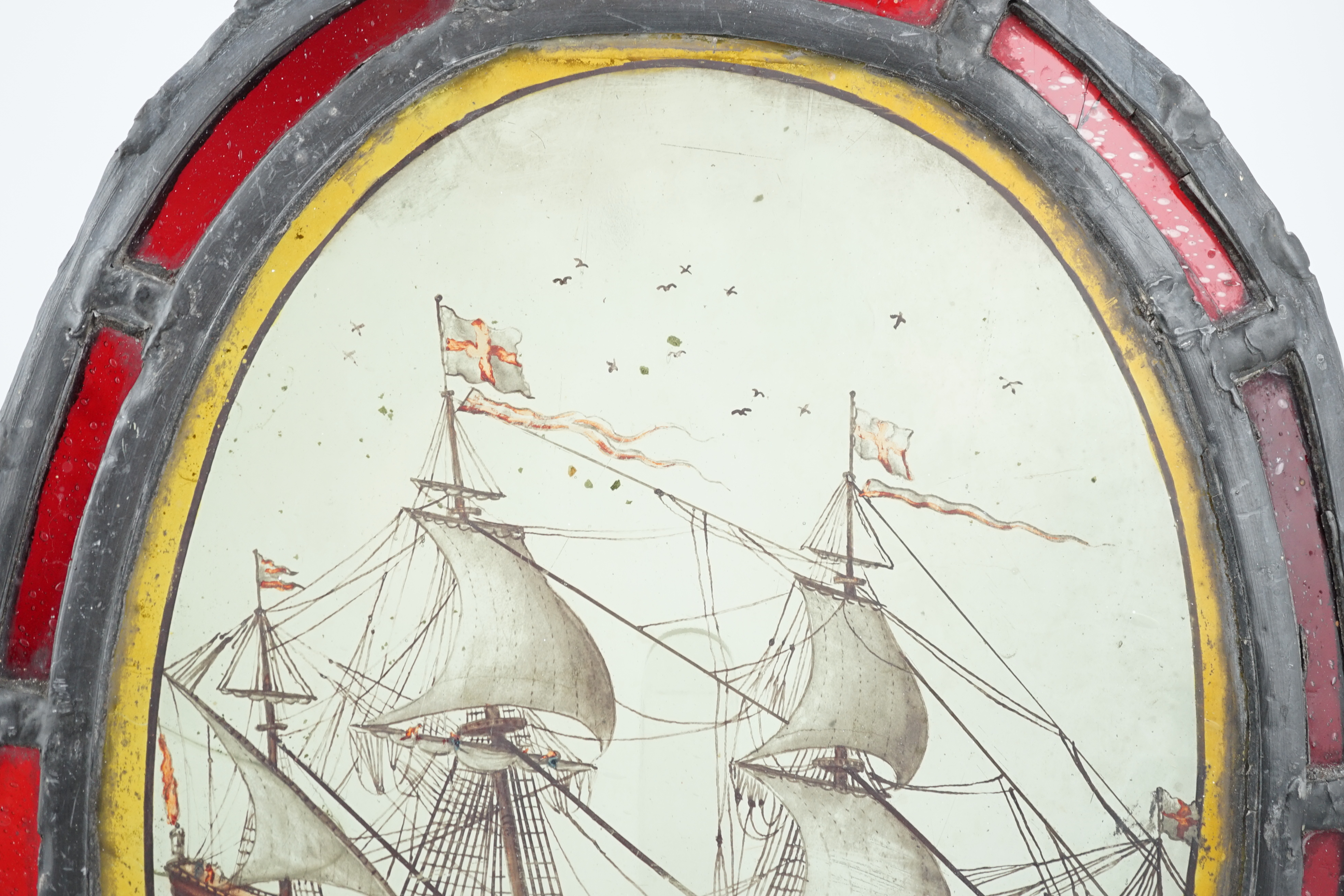 An early 18th century stained glass panel, overall 30 x 24cm